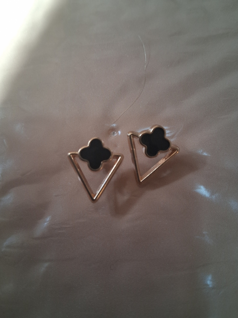 Gold Triangle Stud Earrings with Black Clover Accent